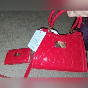 Bebe Dana Red Monogram Top Handle Crossbody bag and matching wallet.